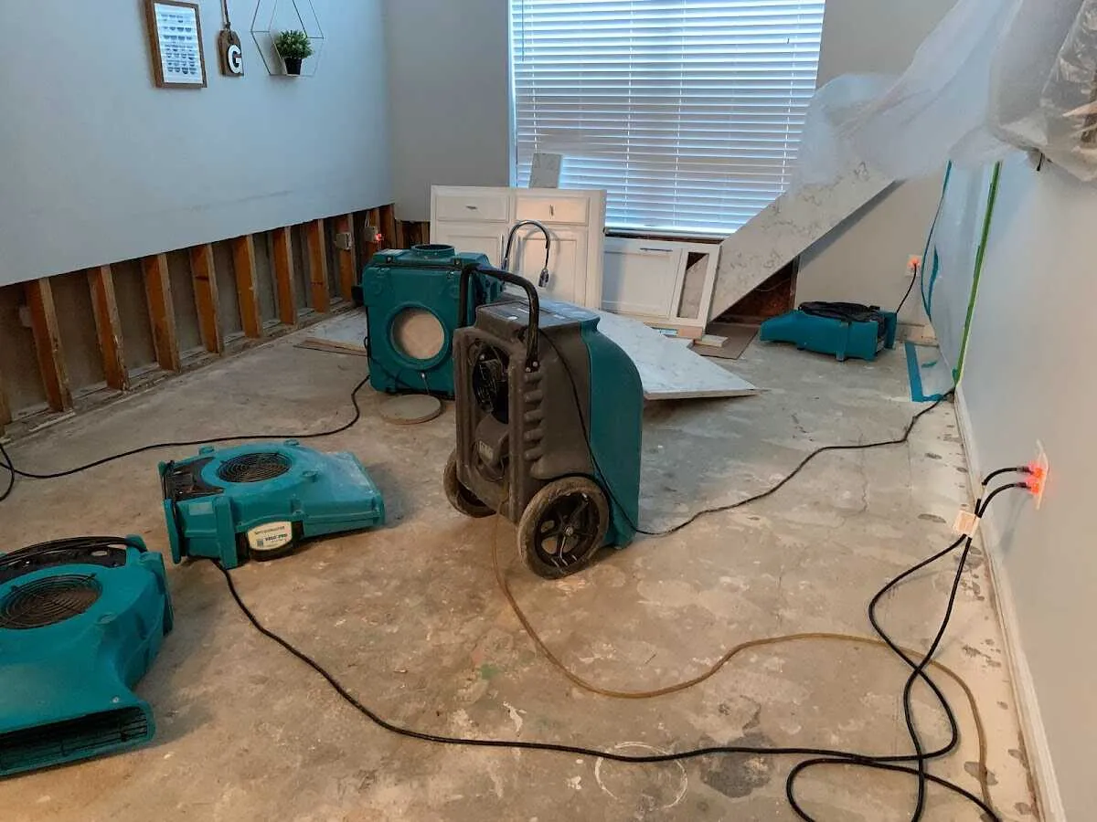 Dehumidifier in flood-cut room for Water Damage Restoration in Pendleton
